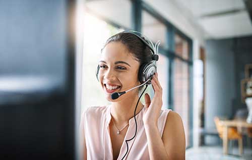 Woman in a call center with a headset